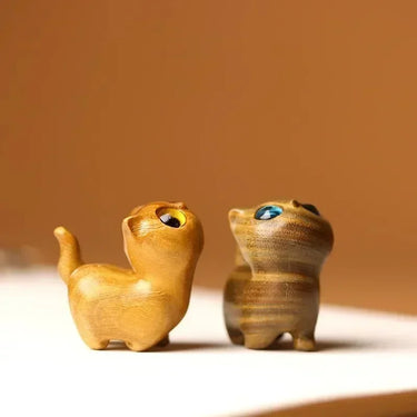 KittyNook Cat Co. Handcrafted Wooden Kitten Figurines add natural elegance to your decor with their large-eyed charm.